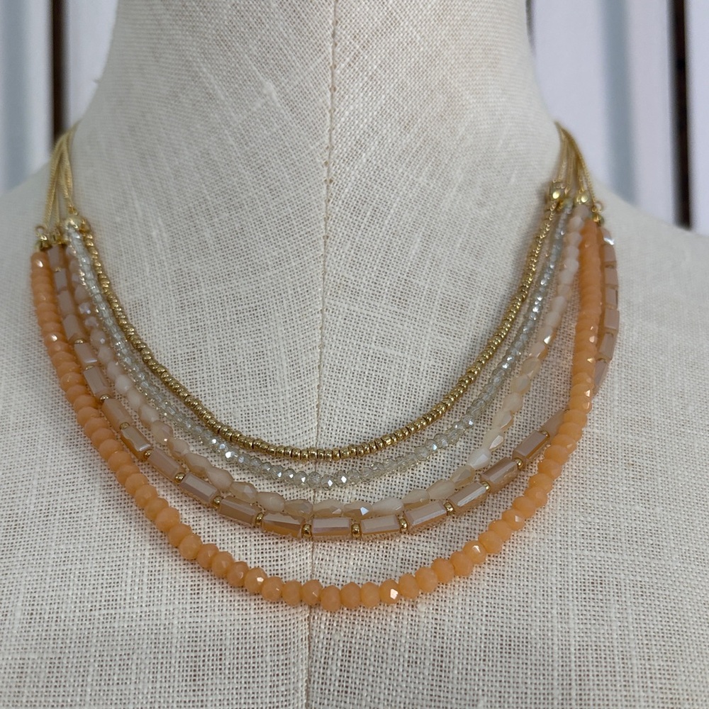 Chic Multi-Layered Beaded Necklace in Gold and Cream